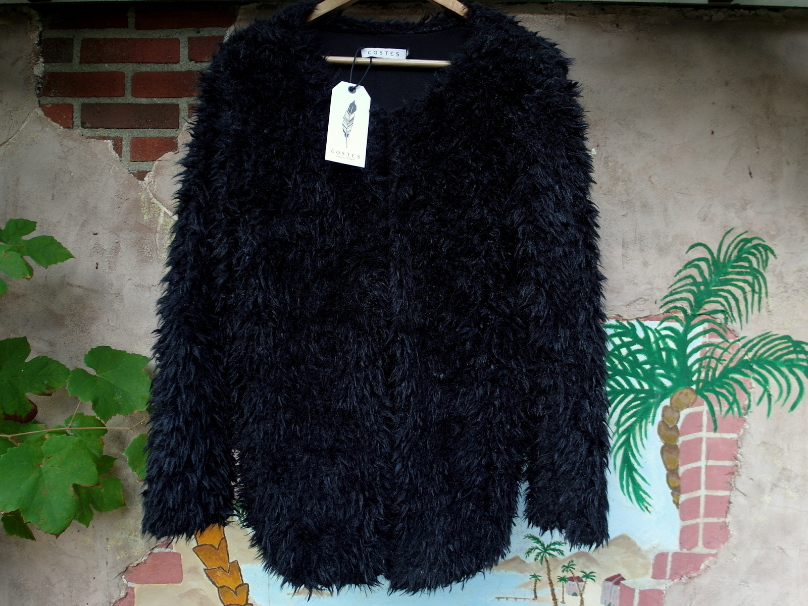 in Fluffy Costes vest - People Stare