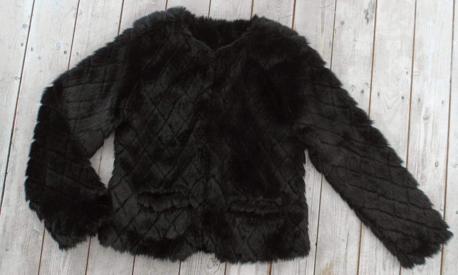 New in | Black fake fur